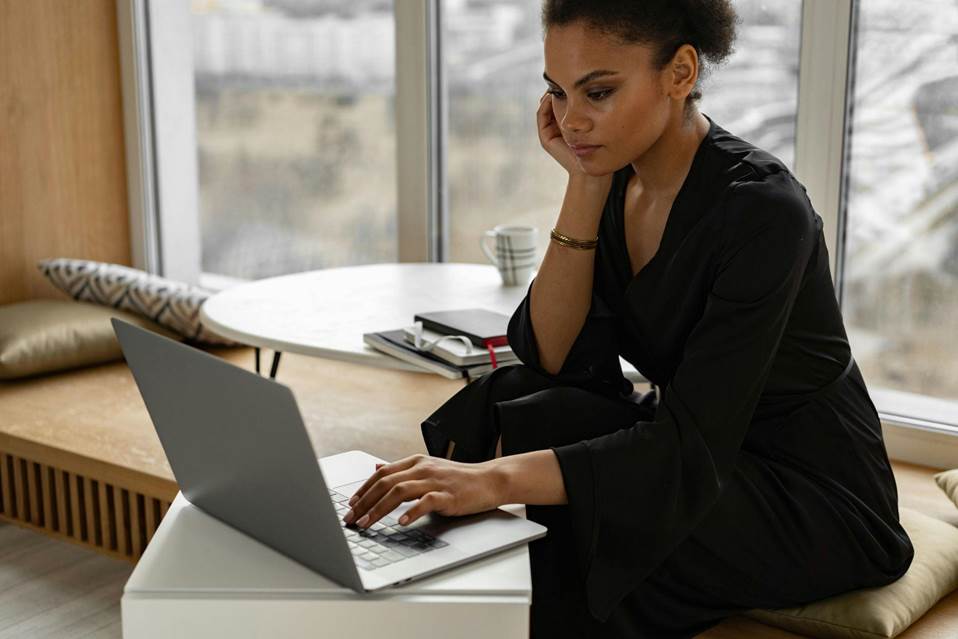 Woman working at a laptop