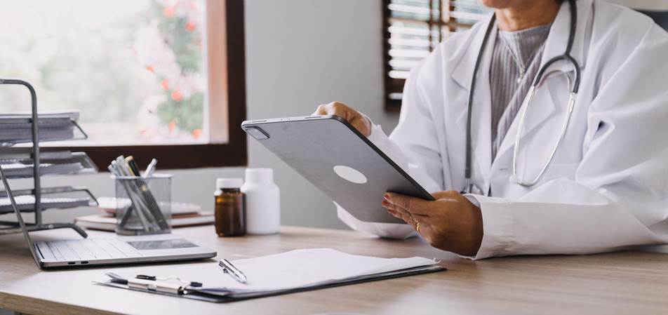 Doctor assessing data